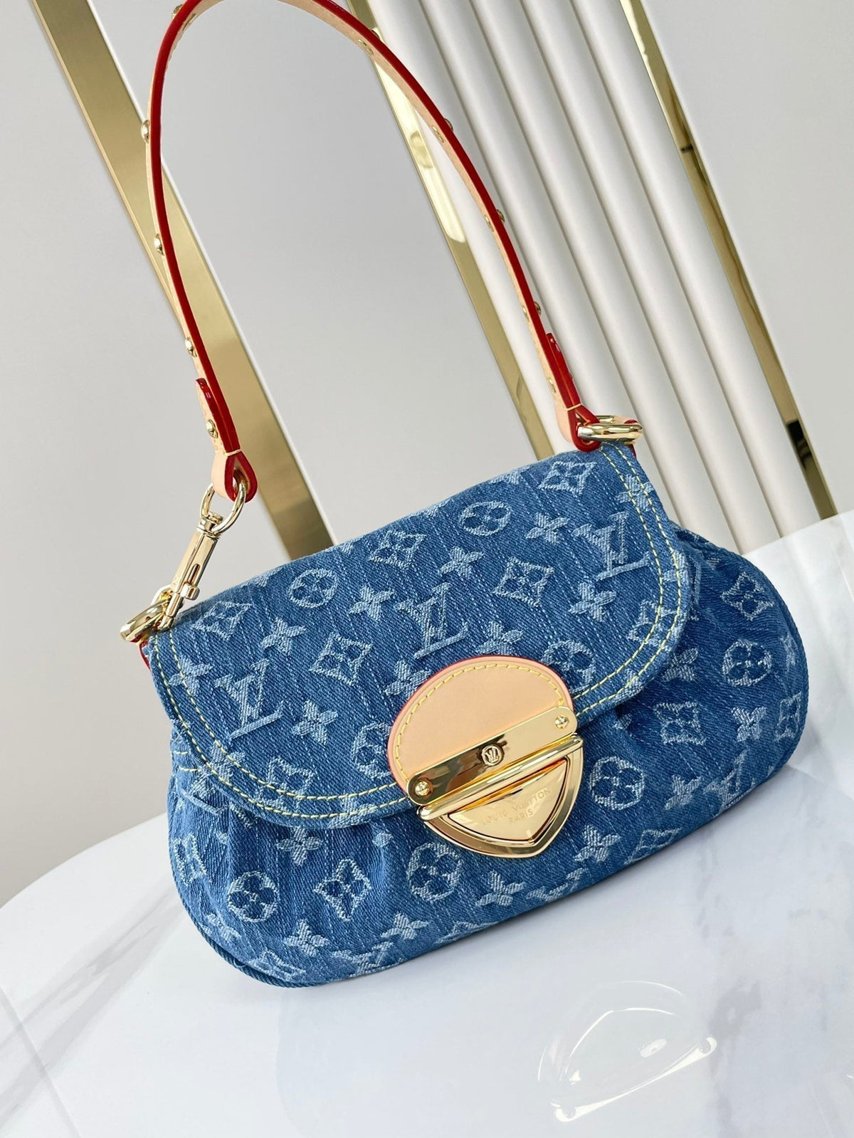 SUNSET 27 IN BLUE MONOGRAM DENIM GOLD BUCKLE