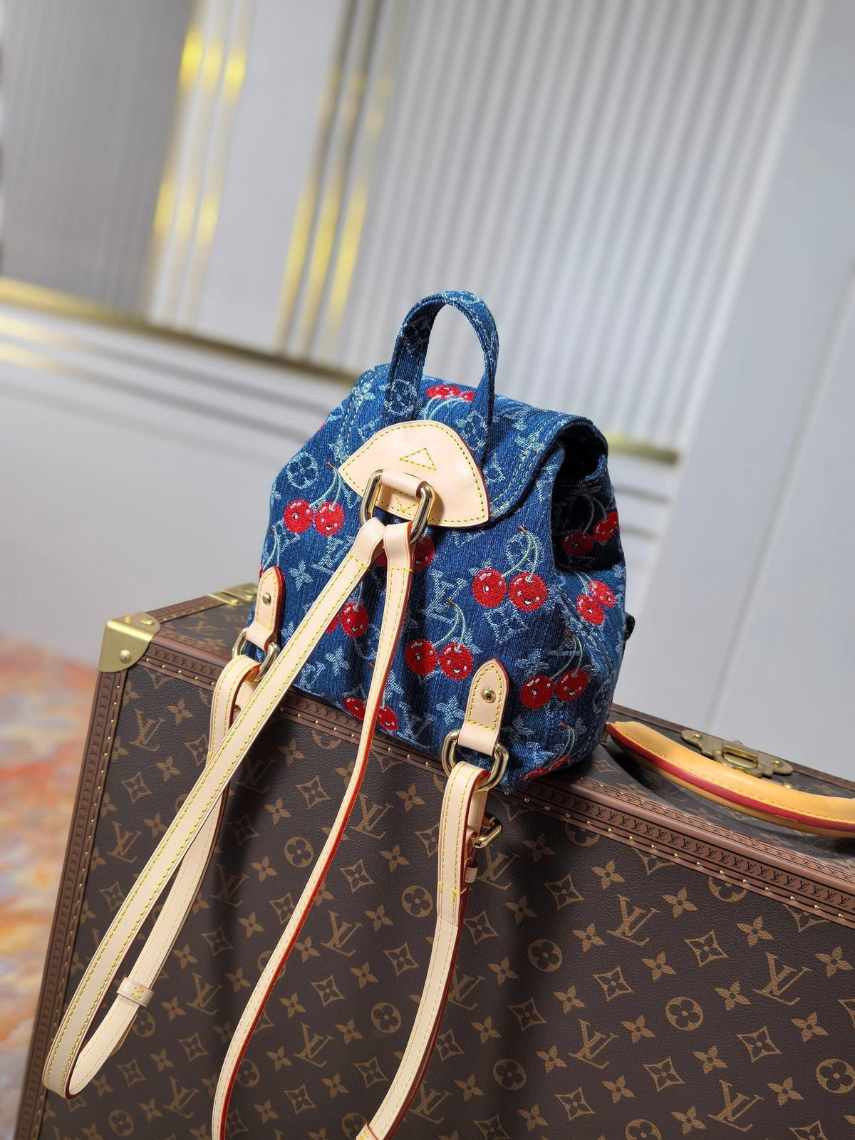 LV 25S VENICE BACKPACK 26 IN BLUE DENIM MONOGRAM CHERRY GOLD HARDWARE